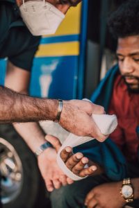 EMT assisting car accident victim